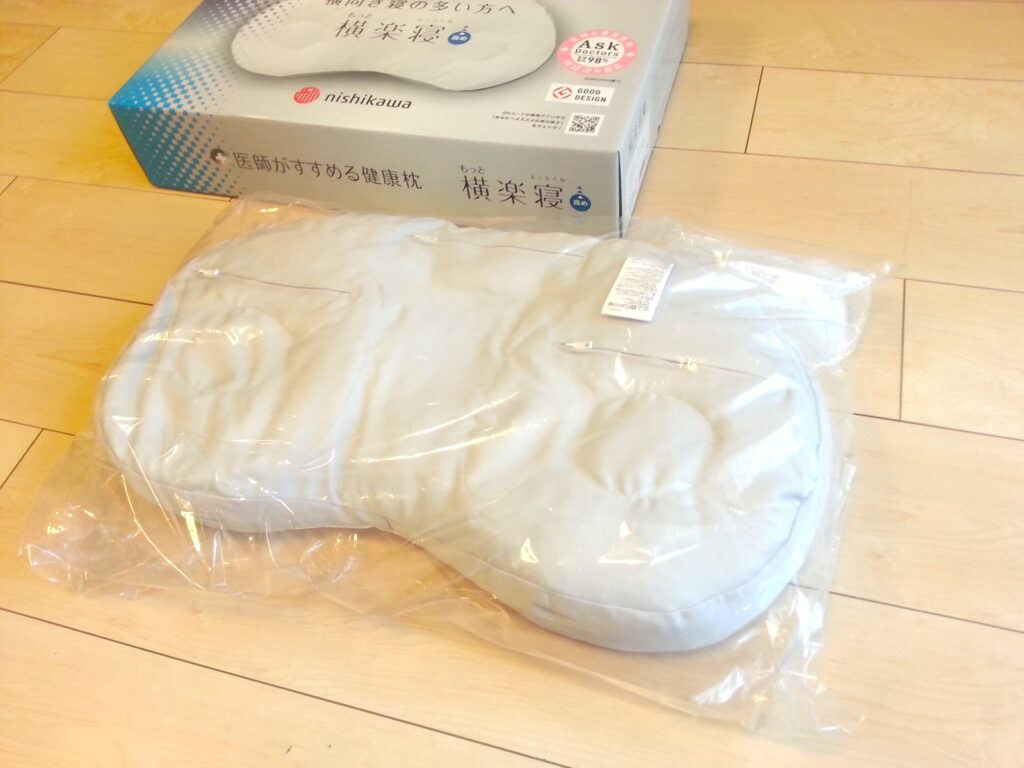 西川「横楽寝」ビニールに包まれた製品の写真